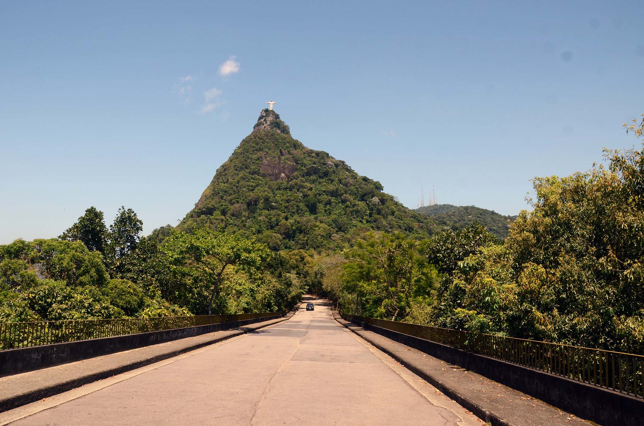 Driving toward Rio de Janeiro's Christ the Redeemer statue, surrounded by dense forest